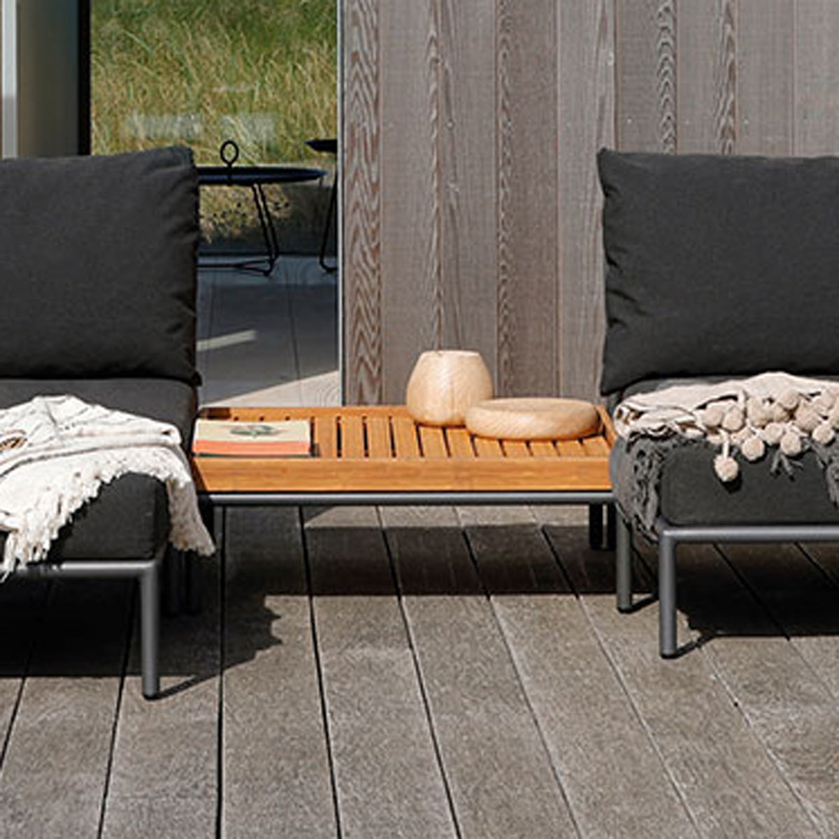 Level 2 Outdoor Lounge Sectional Chair by Houe, showing closeup view of level 2 outdoor lounge sectional chairs in live shot.