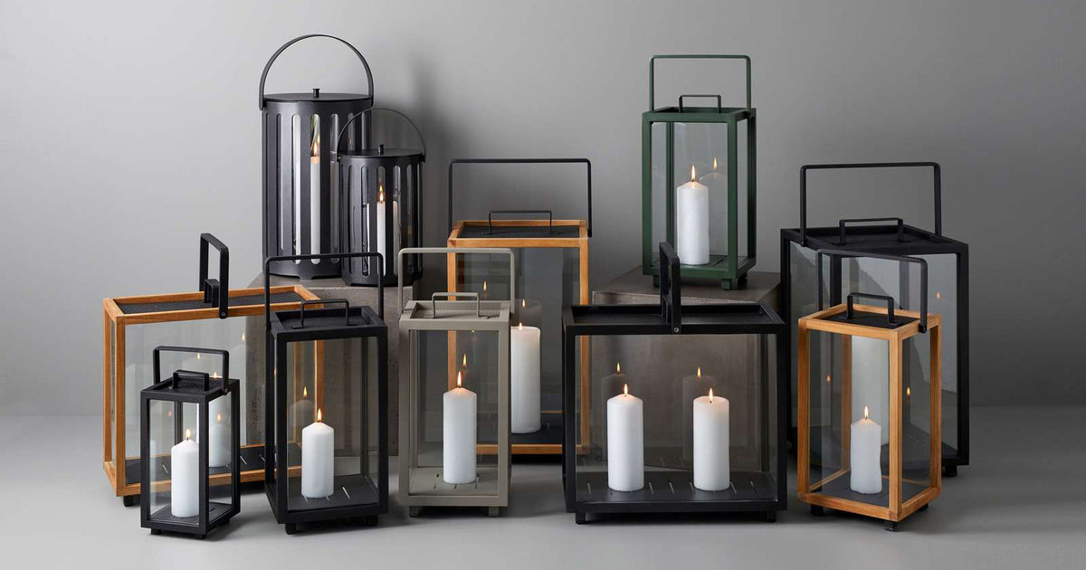Lighthouse Small Lantern by Cane-Line, showing lighthouse small lanterns in live shot.