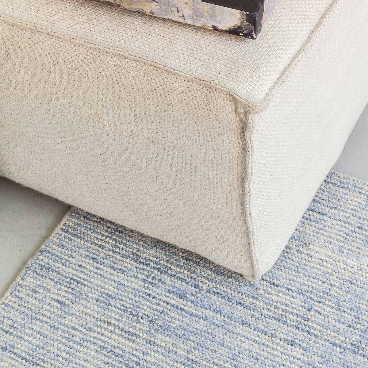 Oat Hand Woven Rug by Ligne Pure, showing oat hand woven rug in live shot.