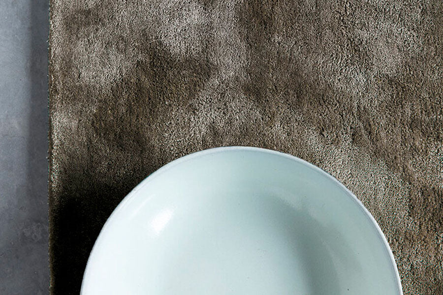 Traces Hand Woven Rug by Ligne Pure, showing traces hand woven rug in live shot.