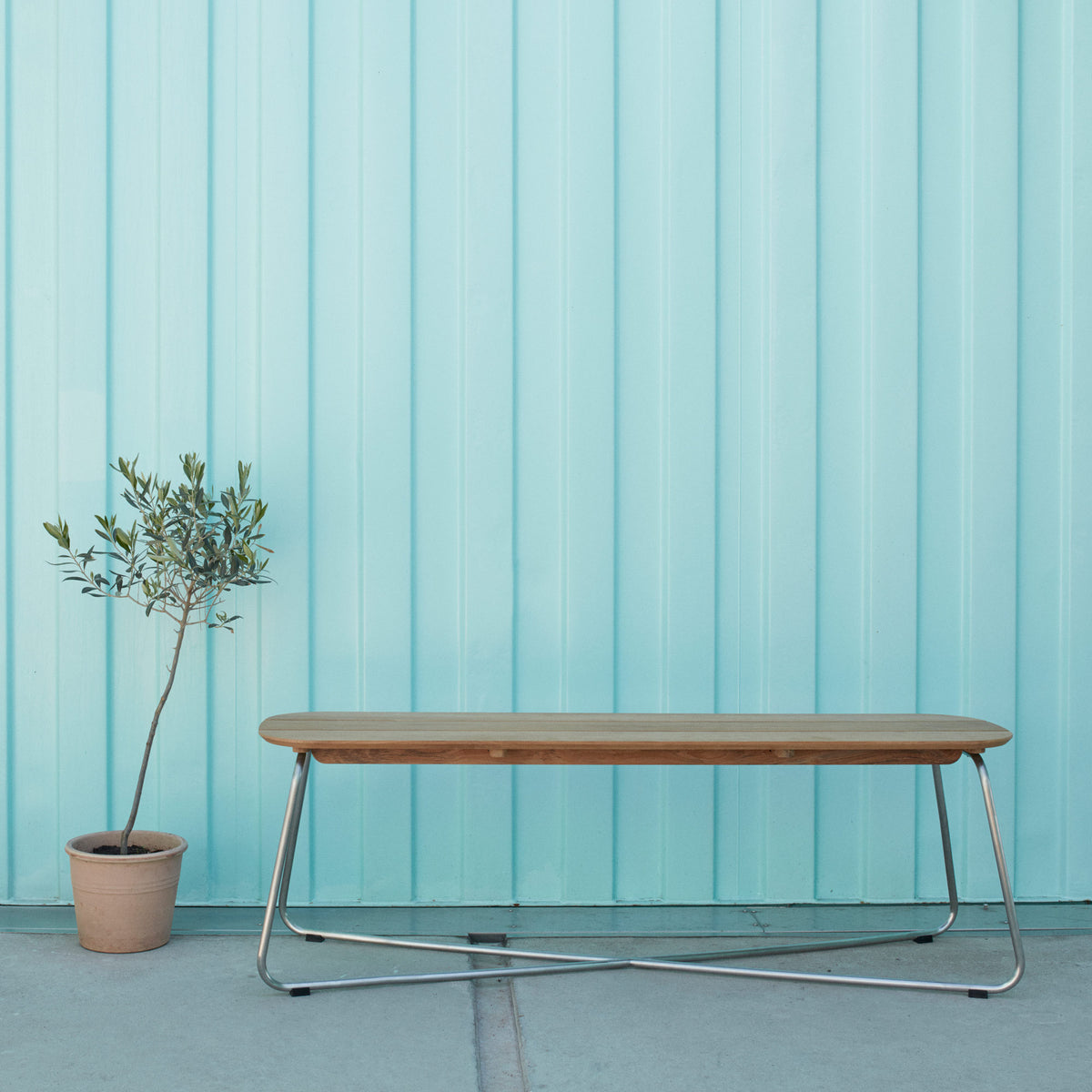 Lilium Teak Bench by Skagerak, showing lilium bench in live shot.