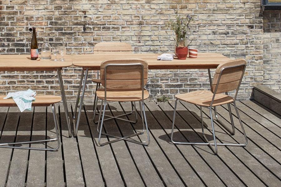 Lilium Teak Chair by Skagerak, showing lilium teak chair in live shot.