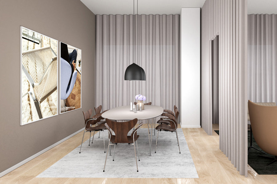 Lily Armchair by Fritz Hansen, showing lily armchairs in live shot.