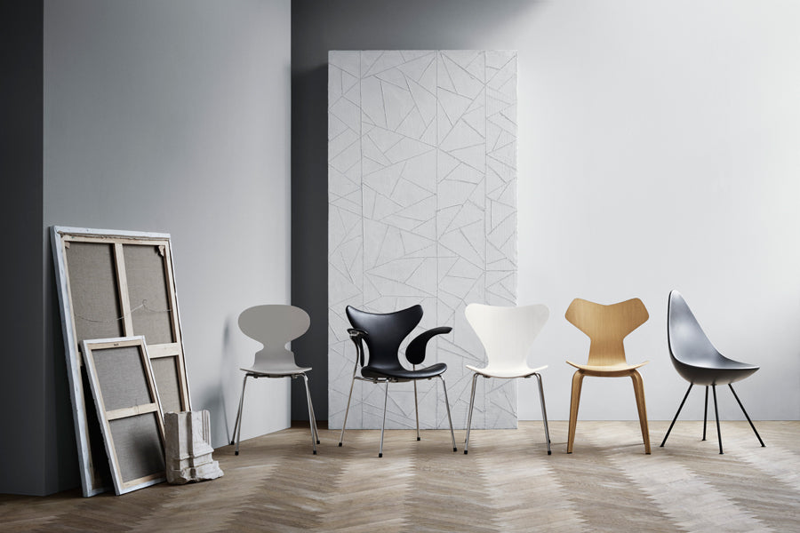 Lily Armchair by Fritz Hansen, showing lily armchair in live shot.