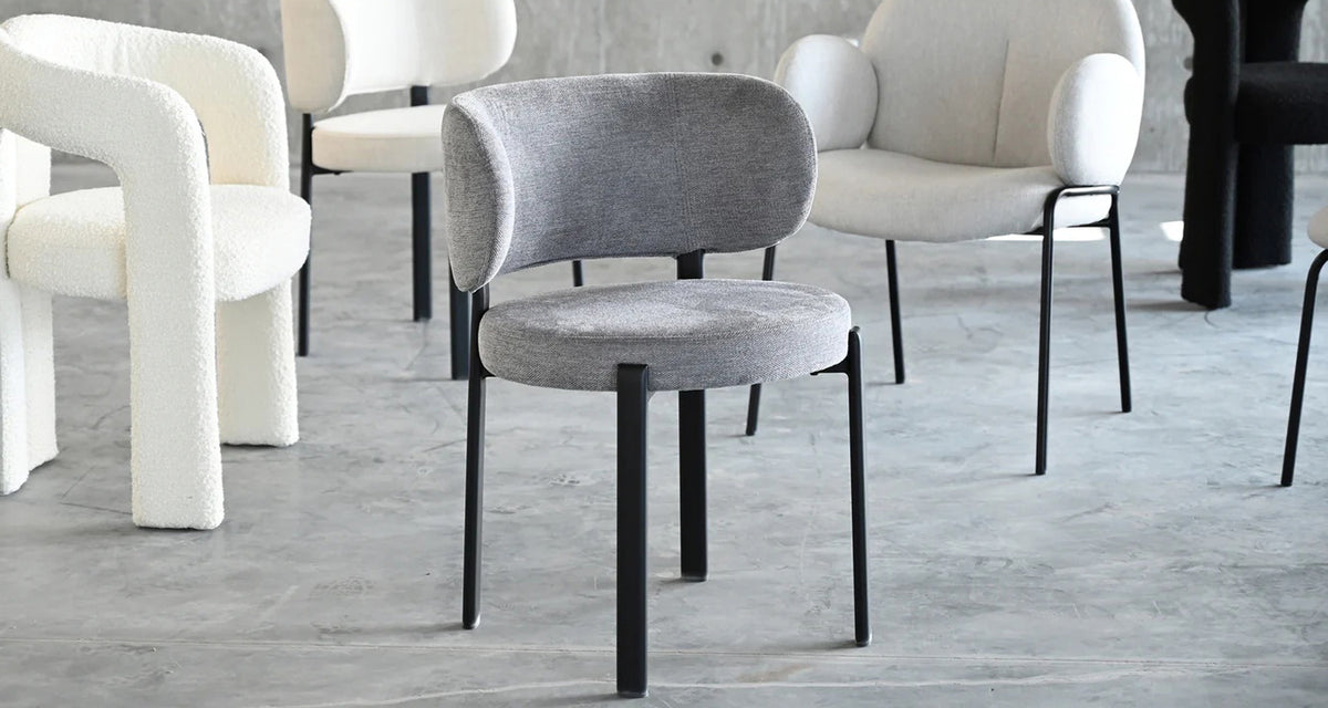 Lily Dining Chair by Mobital, showing lily dining chair with chairs in live shot.