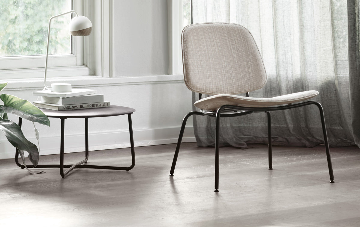 Lily Lounge Table by Mater, showing lily lounge table in live shot.
