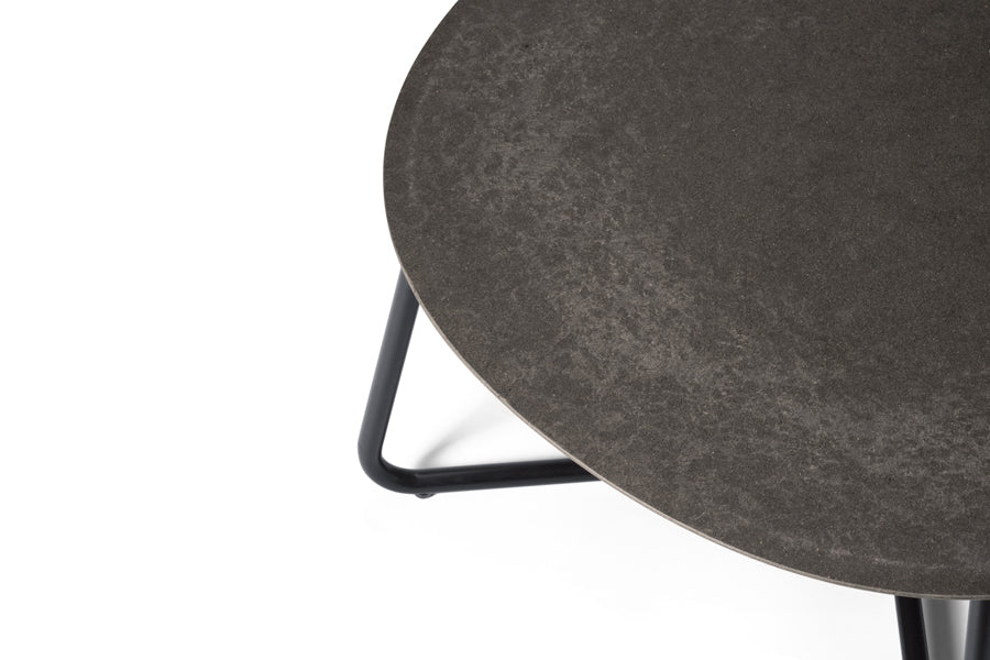 Lily Lounge Table by Mater, showing closeup/top view of lily lounge table in black coffee waste.