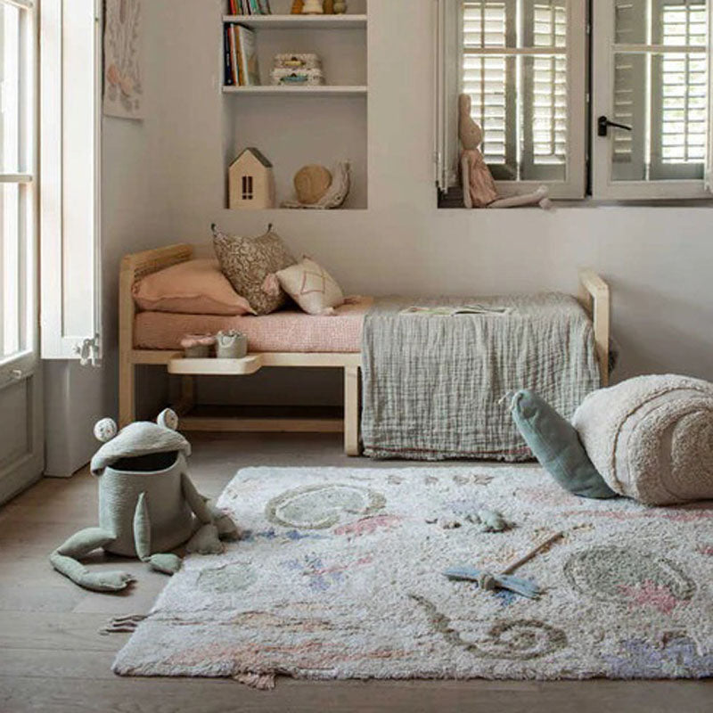 Lily Pond Washable Play Rug by Lorena Canals, showing lily pond washable play rug in live shot.