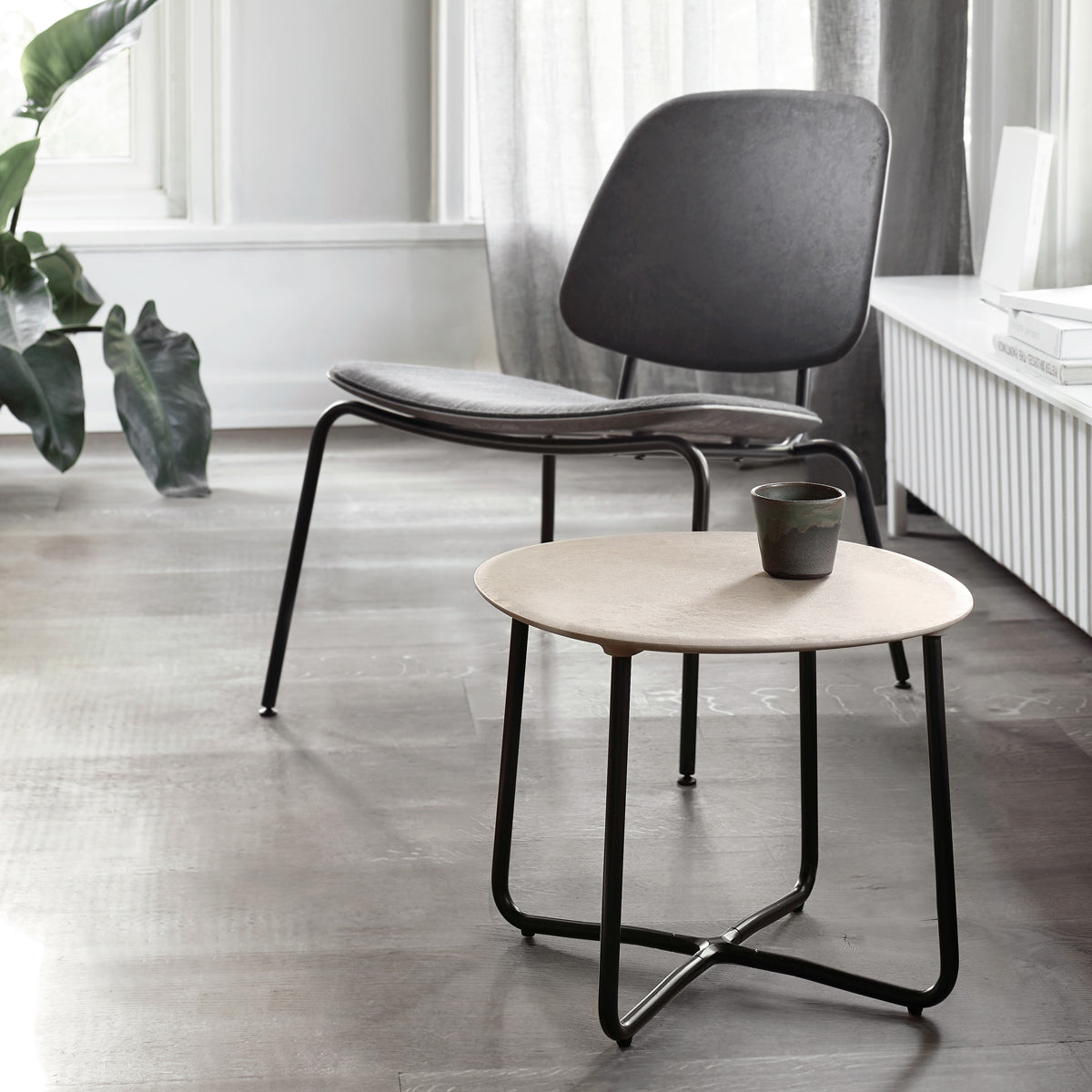 Lily Side Table by Mater, showing lily side table in live shot.