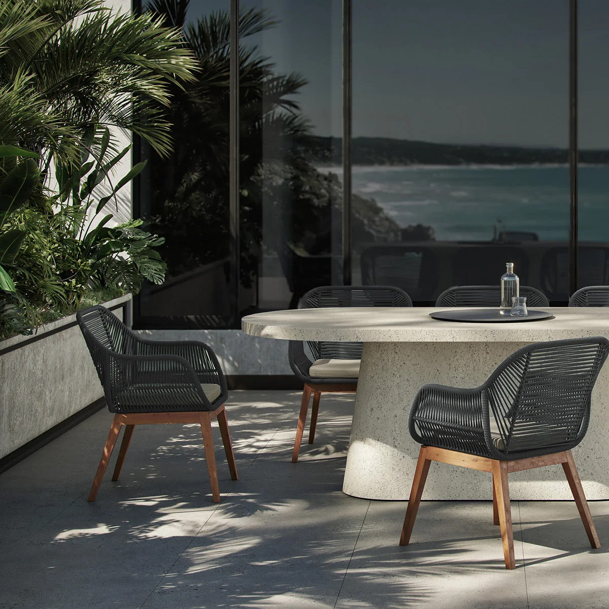 Liora Outdoor Dining Chair by Viesso, showing liora outdoor dining chairs in live shot.