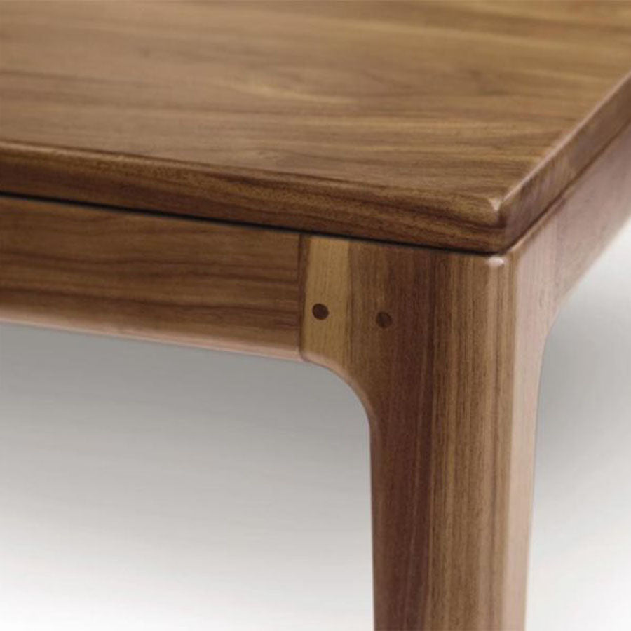 Lisse Extension with Easystow Extension and Leaf Storage Table by Copeland Furniture, showing closeup view of lisse extension with easystow extension and leaf storage table.