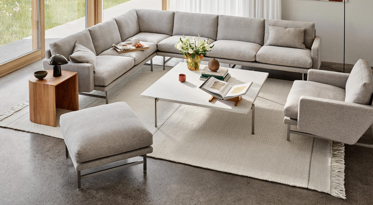 Lissoni Pouf by Fritz Hansen, showing lissoni pouf in live shot.