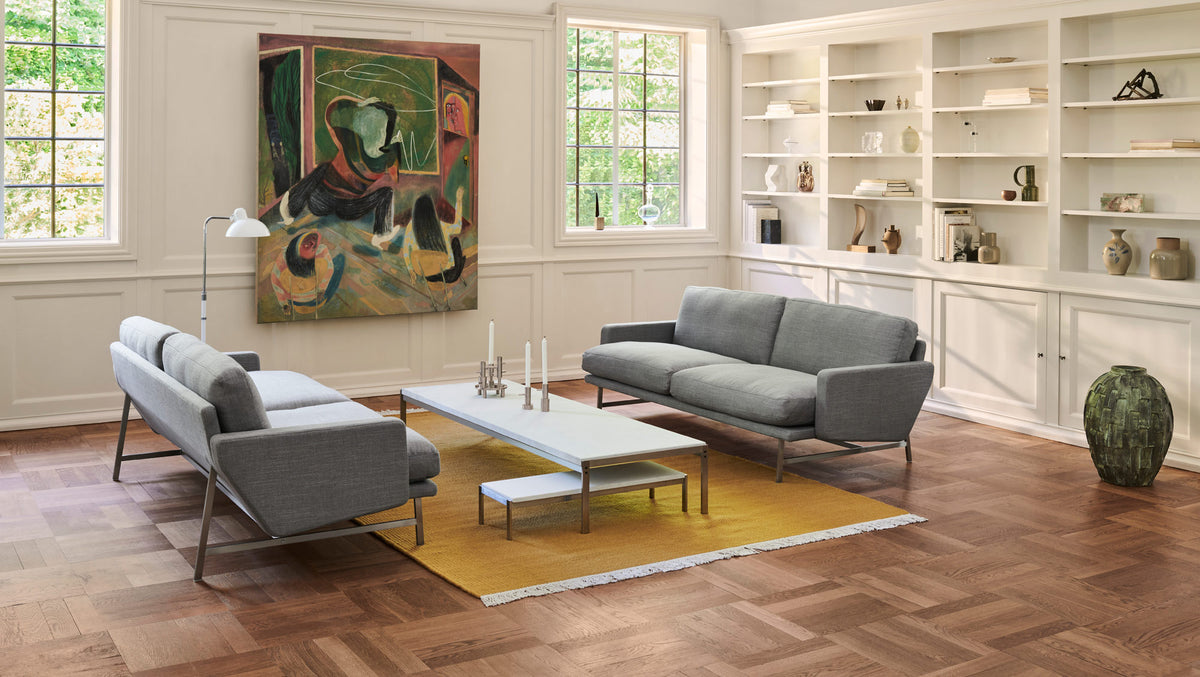 Lissoni Sofa by Fritz Hansen, showing lissoni sofas in live shot.