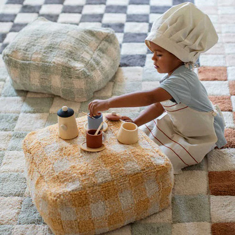Little Chefs Vichy Pouf by Lorena Canals, showing little chefs vichy pouf in live shot.