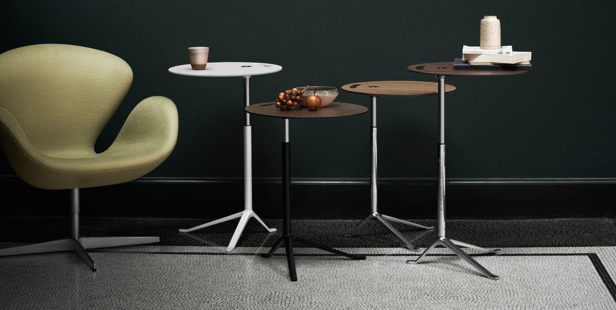 Little Friend Side Table by Fritz Hansen, showing little friend side tables in live shot.