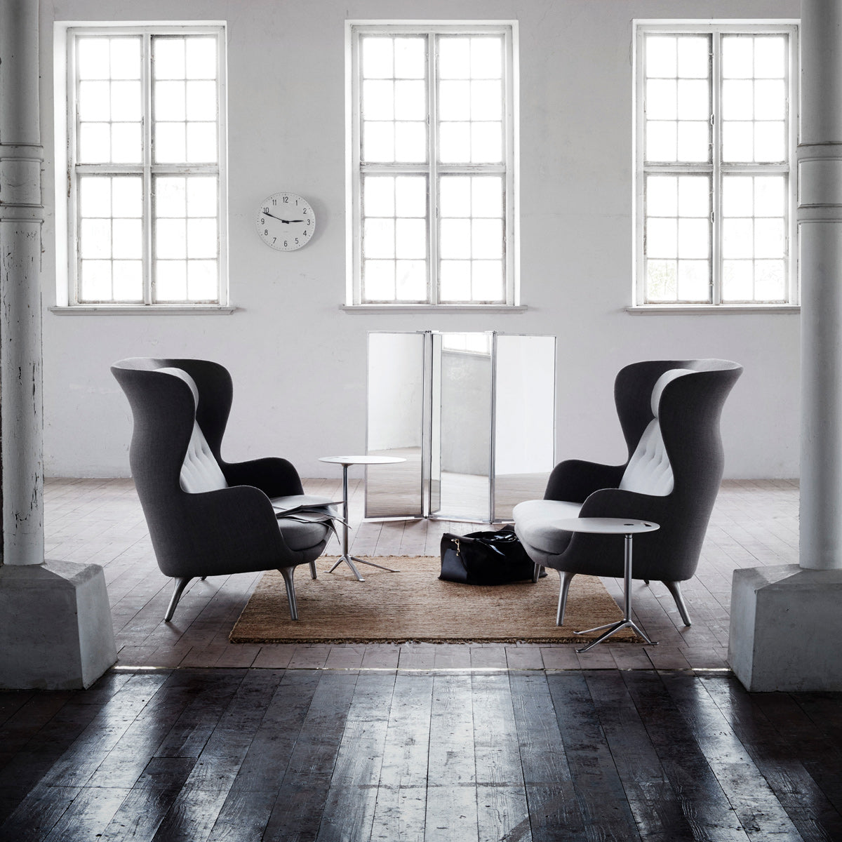 Little Friend Side Table by Fritz Hansen, showing little friend side table in live shot.