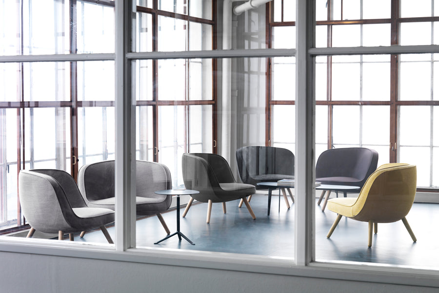 Little Friend Side Table by Fritz Hansen, showing little friend side table in live shot.