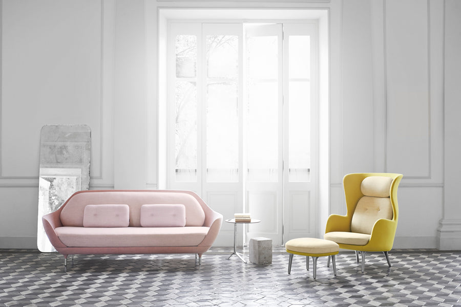 Little Friend Side Table by Fritz Hansen, showing little friend side table in live shot.