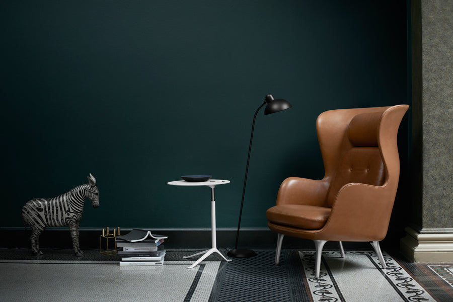 Little Friend Side Table by Fritz Hansen, showing little friend side table in live shot.