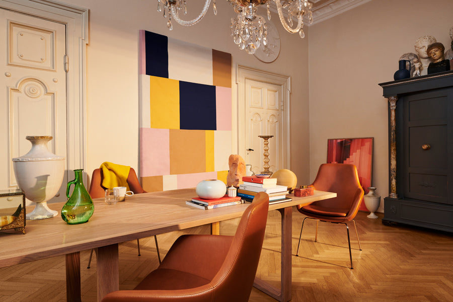 Little Giraffe Chair by Fritz Hansen, showing little giraffe chairs in live shot.