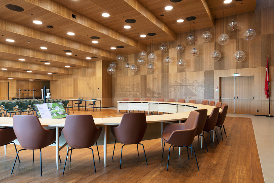 Little Giraffe Chair by Fritz Hansen, showing little giraffe chairs in live shot.