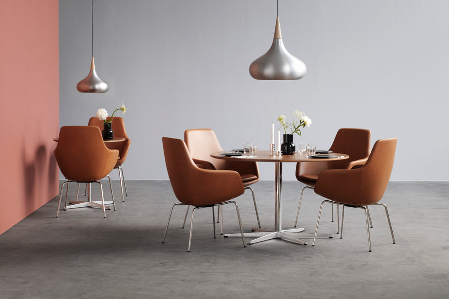 Little Giraffe Removable Cover Chair by Fritz Hansen, showing little giraffe pemovable cover chairs in live shot.