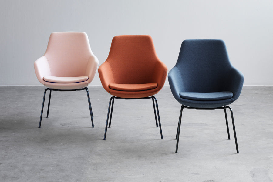Little Giraffe Removable Cover Chair by Fritz Hansen, showing little giraffe pemovable cover chairs in live shot.