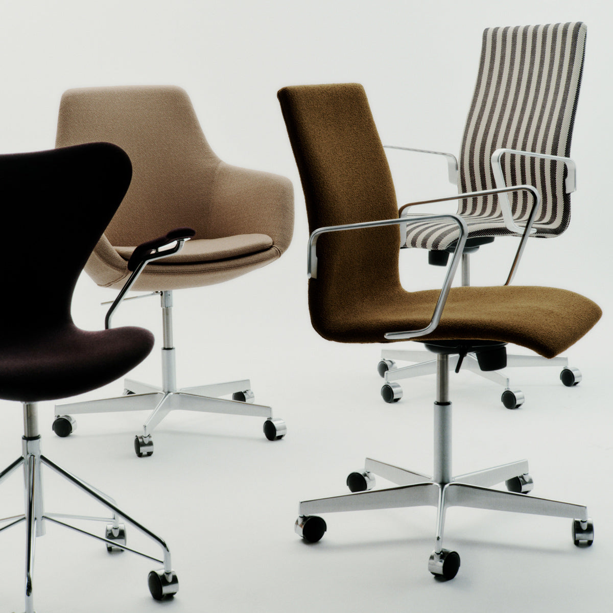 Little Giraffe Removable Cover Swivel Chair by Fritz Hansen, showing little giraffe removable cover swivel chair in live shot.