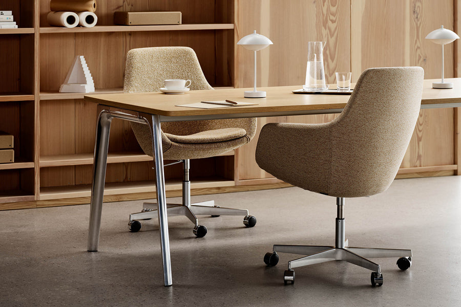Little Giraffe Removable Cover Swivel Chair by Fritz Hansen, showing little giraffe removable cover swivel chairs in live shot.