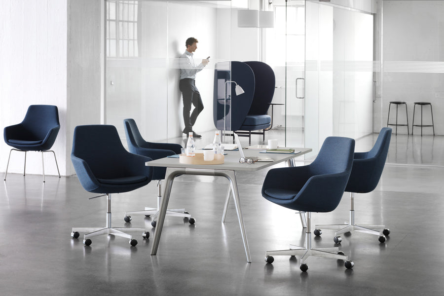 Little Giraffe Removable Cover Swivel Chair by Fritz Hansen, showing little giraffe removable cover swivel chairs in live shot.