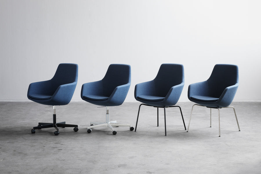 Little Giraffe Removable Cover Swivel Chair by Fritz Hansen, showing little giraffe removable cover swivel chairs in live shot.