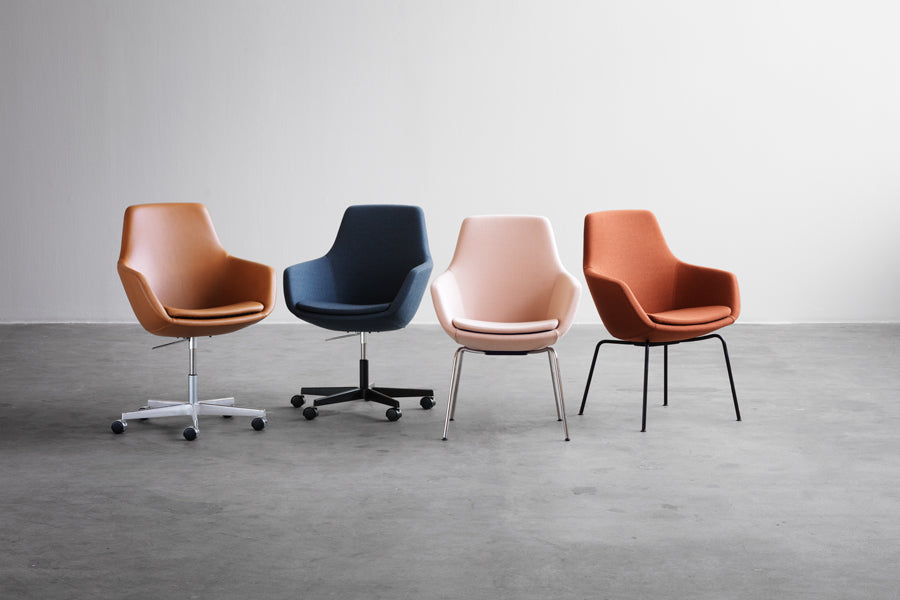 Little Giraffe Removable Cover Swivel Chair by Fritz Hansen, showing little giraffe removable cover swivel chairs in live shot.