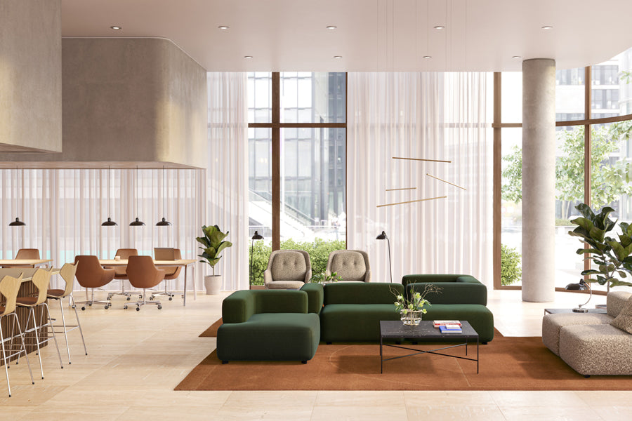 Little Giraffe Swivel Chair by Fritz Hansen, showing little giraffe swivel chairs in live shot.
