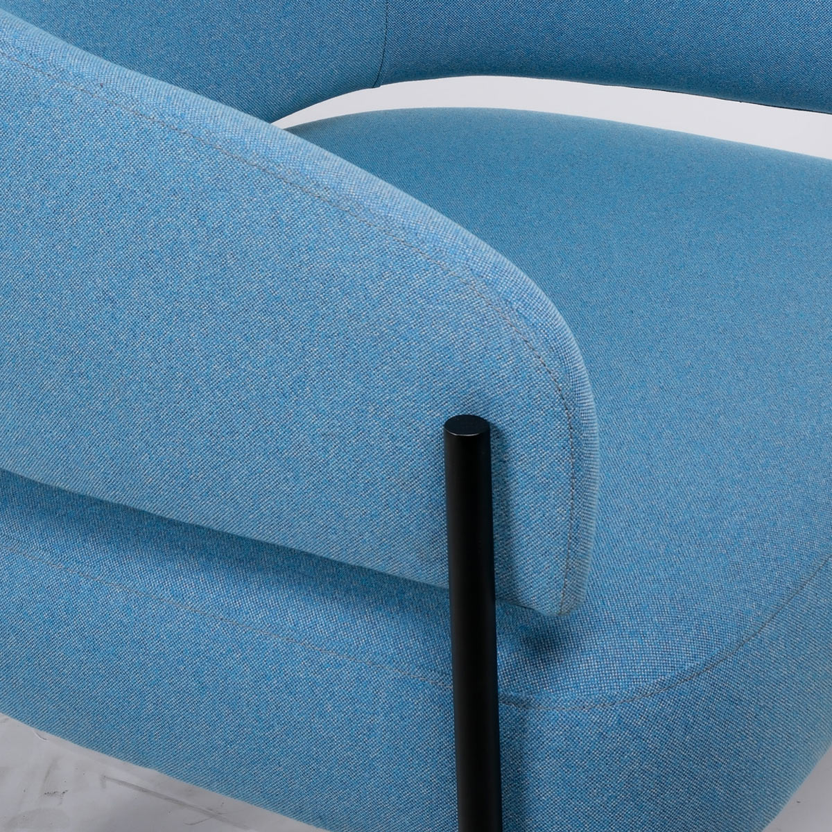 Lorenzo Lounge Chair by Kollektiff, showing closeup view of lorenzo lounge chair in live shot.