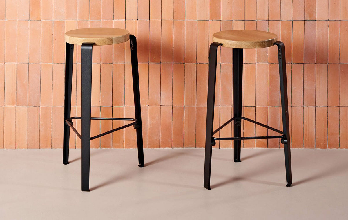 Lou Triangle Bar Stool by TipToe, showing lou triangle bar stools in live shot.