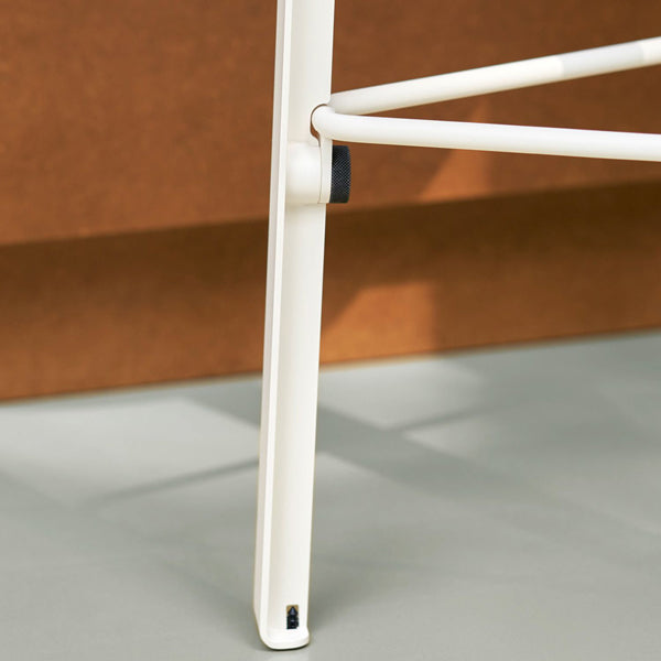 Lou Triangle Bar Stool by TipToe, showing closeup view of lou triangle bar stool in live shot.