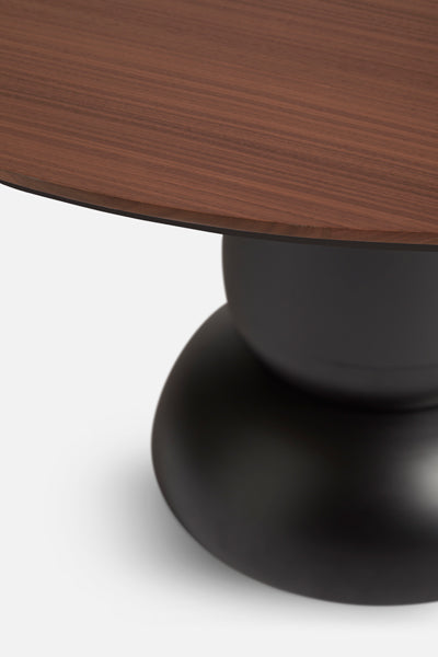 Ludo Dining Table by Woud, showing closeup view of ludo dining table in live shot.