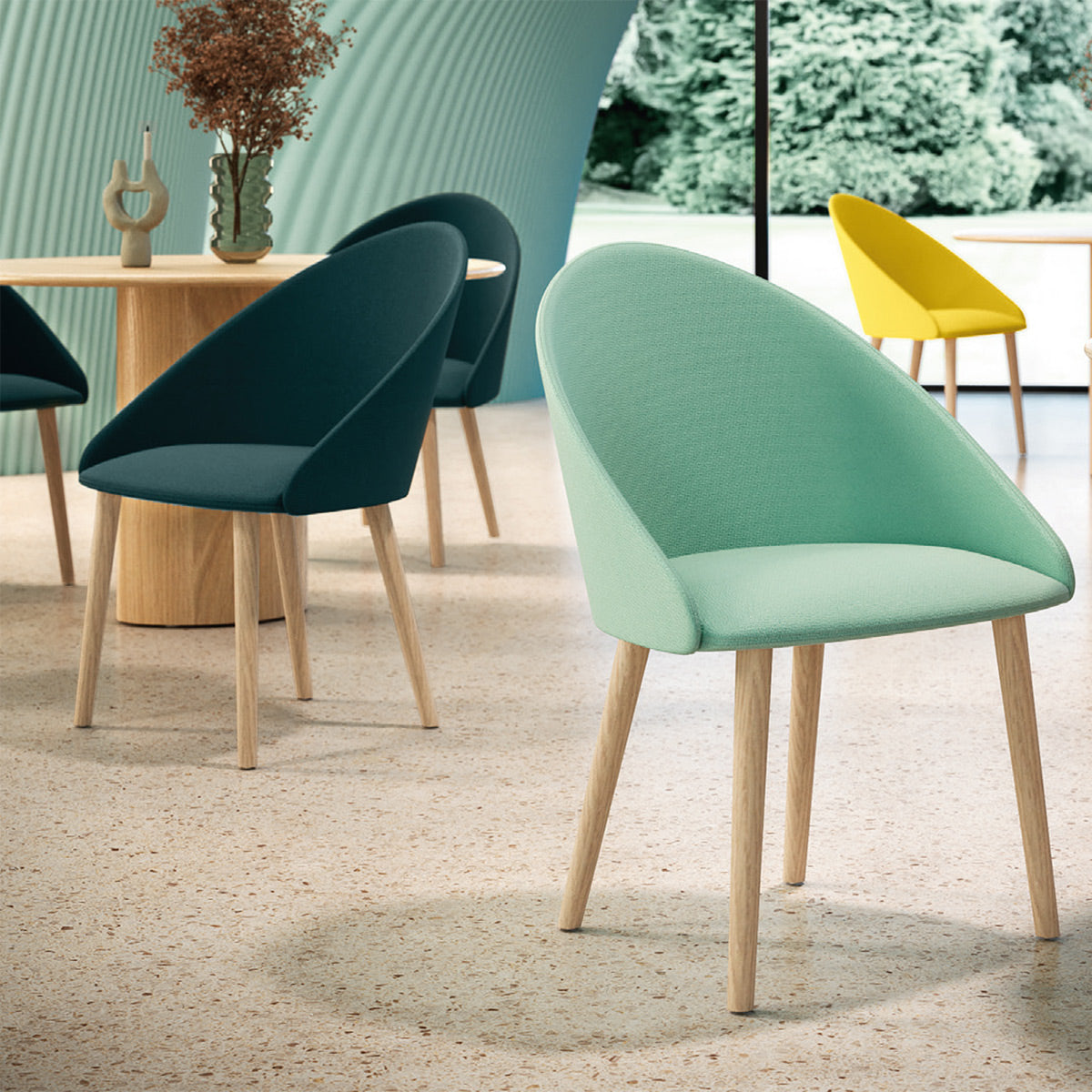 Luna Armchair by Kollektiff, showing luna armchairs in live shot.