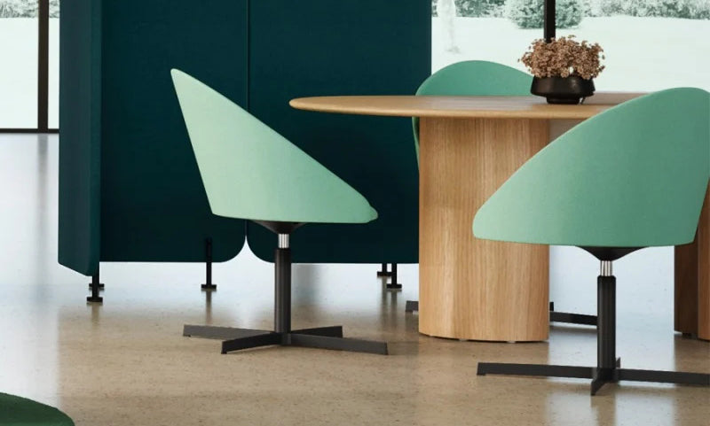 Luna Swivel Armchair by Kollektiff, showing luna swivel armchairs in live shot.