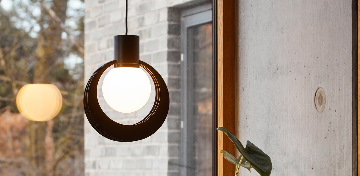 Lunar Pendant by Woud, showing lunar pendant in live shot.