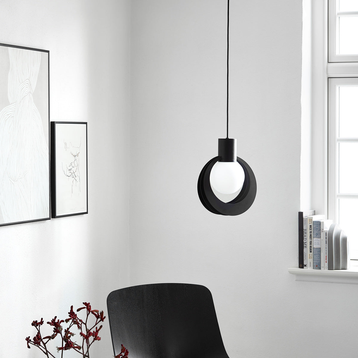 Lunar Pendant by Woud, showing lunar pendant in live shot.