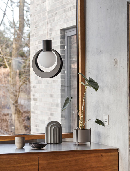 Lunar Pendant by Woud, showing lunar pendant in live shot.