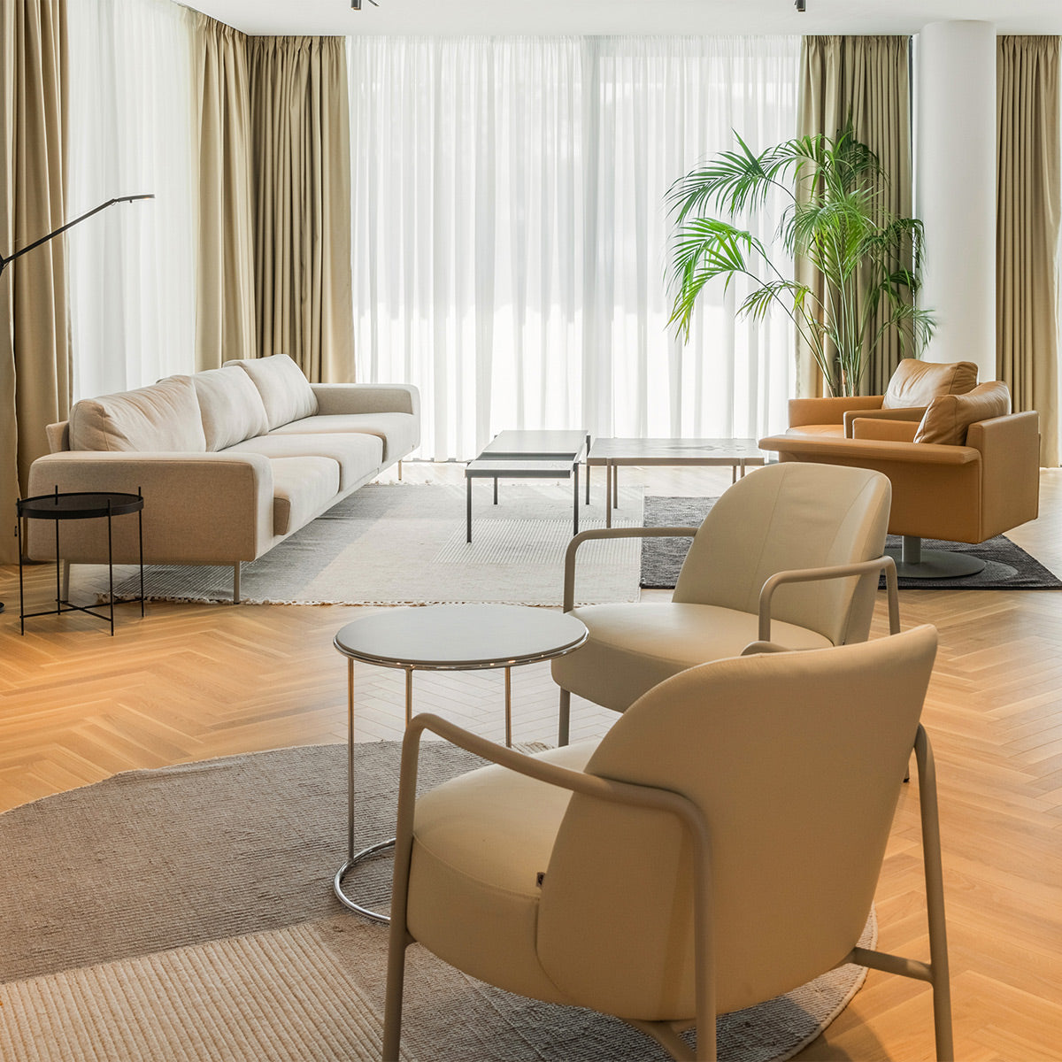 Mabel Comfort Swivel Lounge Chair by B&T, showing mabel comfort swivel lounge chairs in live shot.
