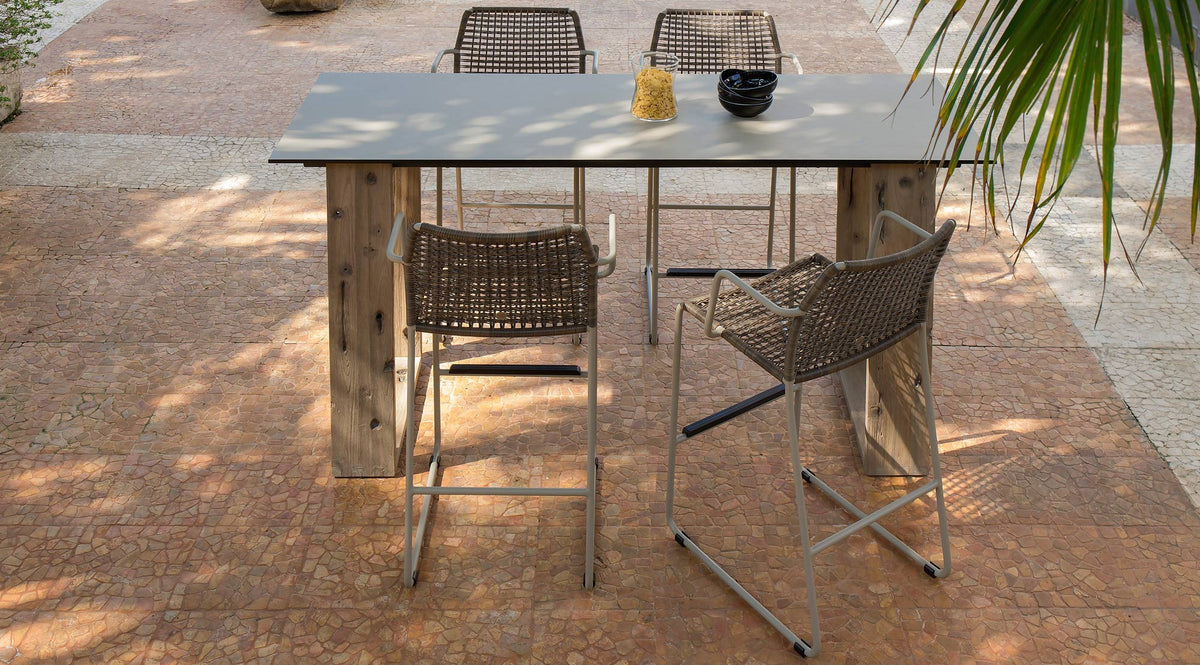 Manda Aluminum Bar Armchair by Mamagreen, showing manda aluminum bar armchairs in live shot.