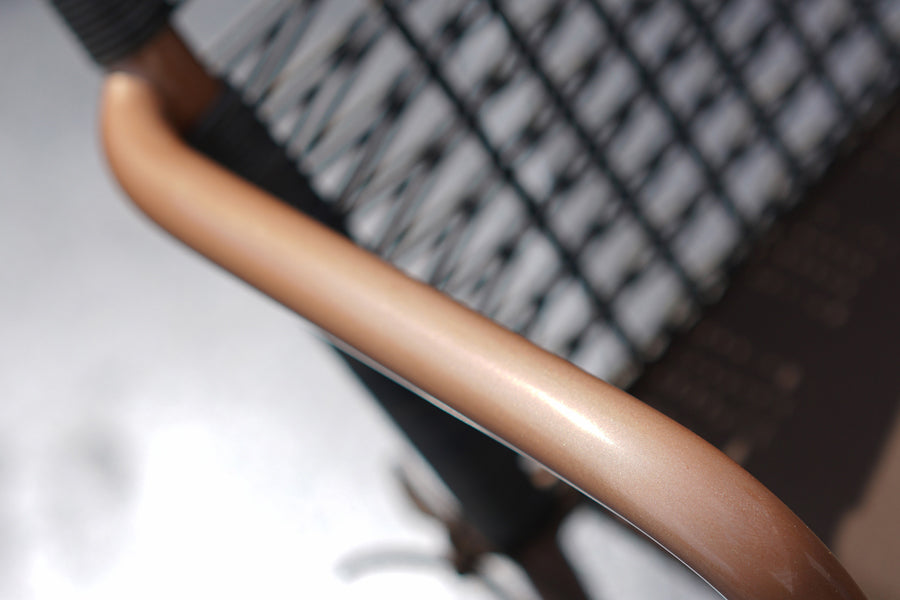 Manda Aluminum Bar Armchair by Mamagreen, showing closeup view of manda aluminum bar armchair in live shot.