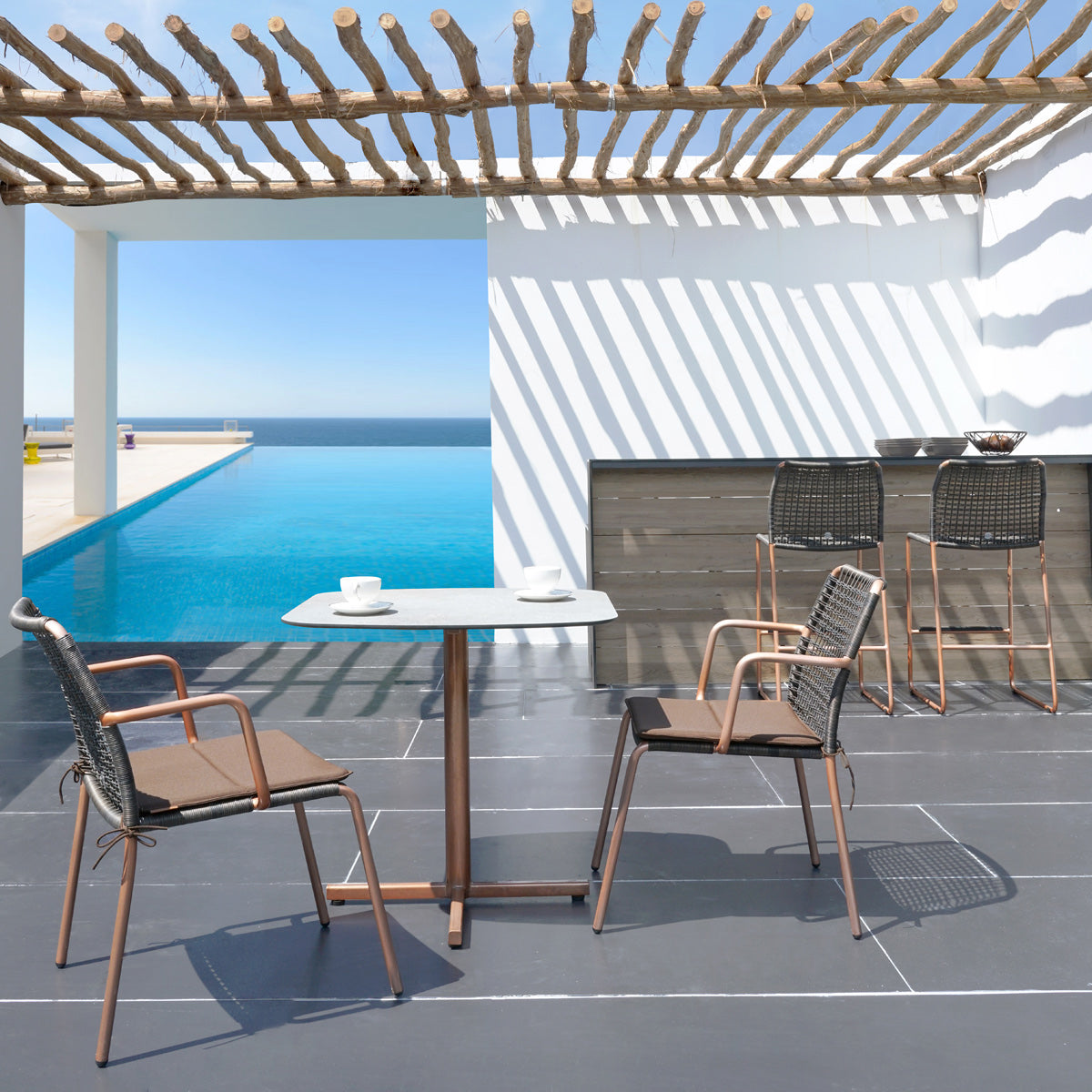 Manda Aluminum Bar Side Chair by Mamagreen, showing manda aluminum bar side chairs in live shot.