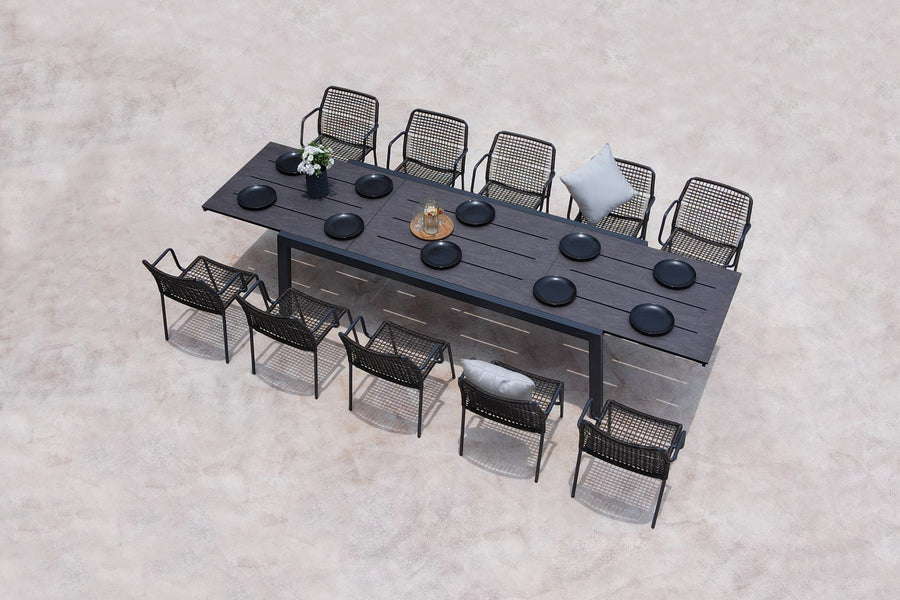 Manda Aluminum Stackable Woven Dining Chair by Mamagreen, showing manda aluminum stackable woven dining chairs in live shot.