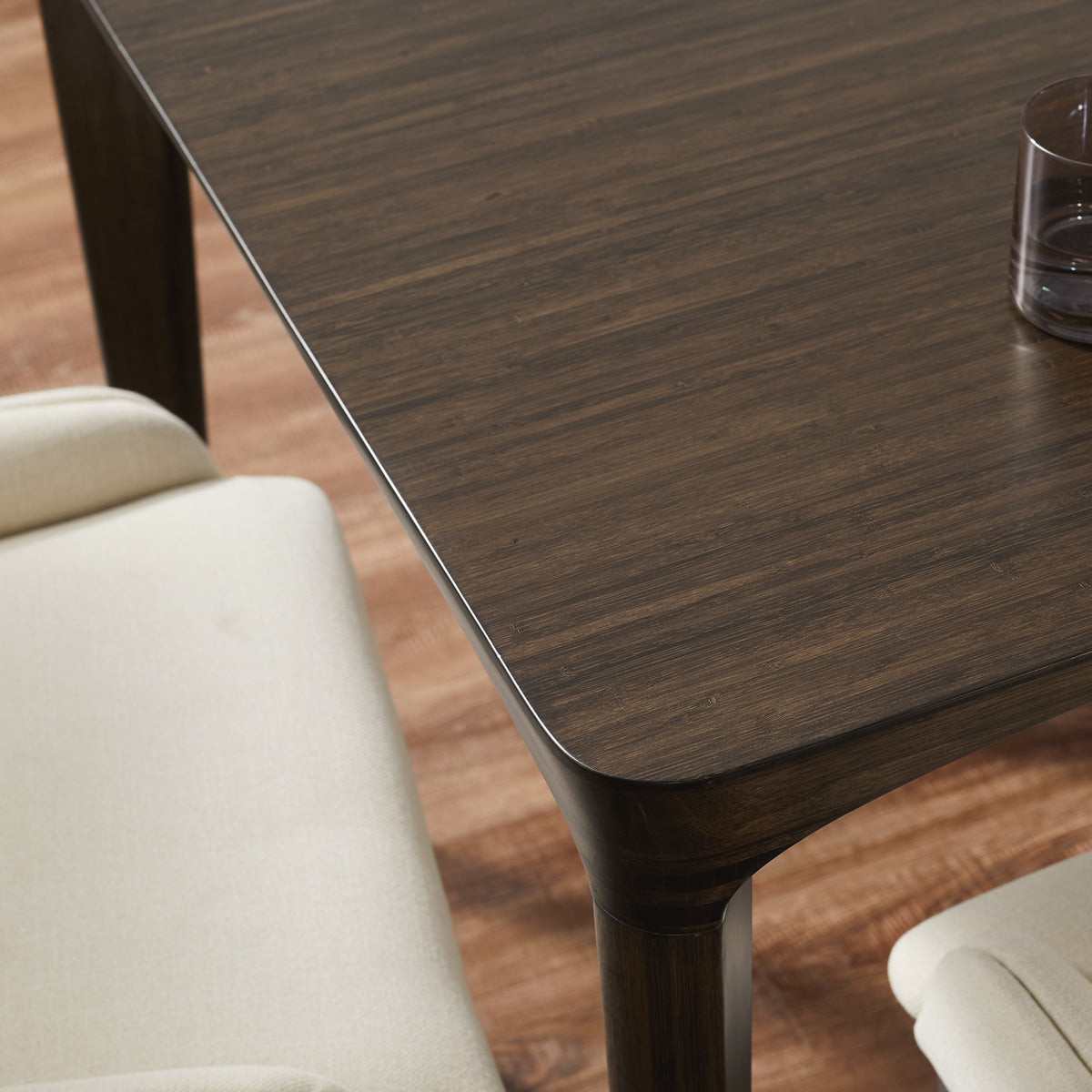 Marseilles Dining Table by Greenington, showing closeup view of marseilles dining table in live shot.