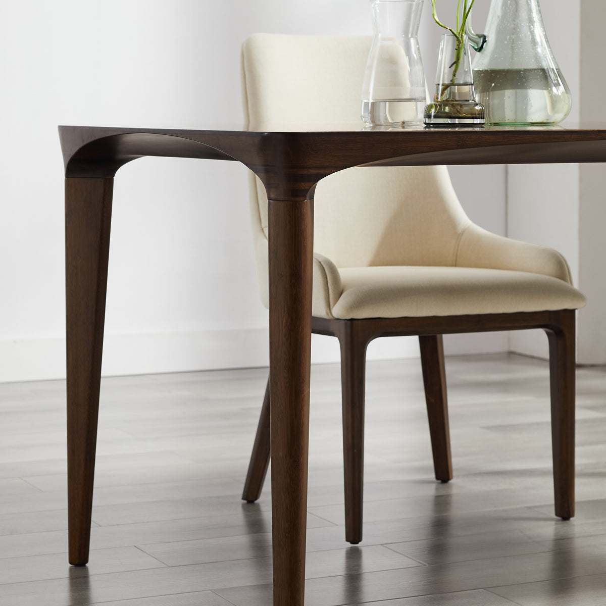 Marseilles Dining Table by Greenington, showing closeup view of marseilles dining table in live shot.