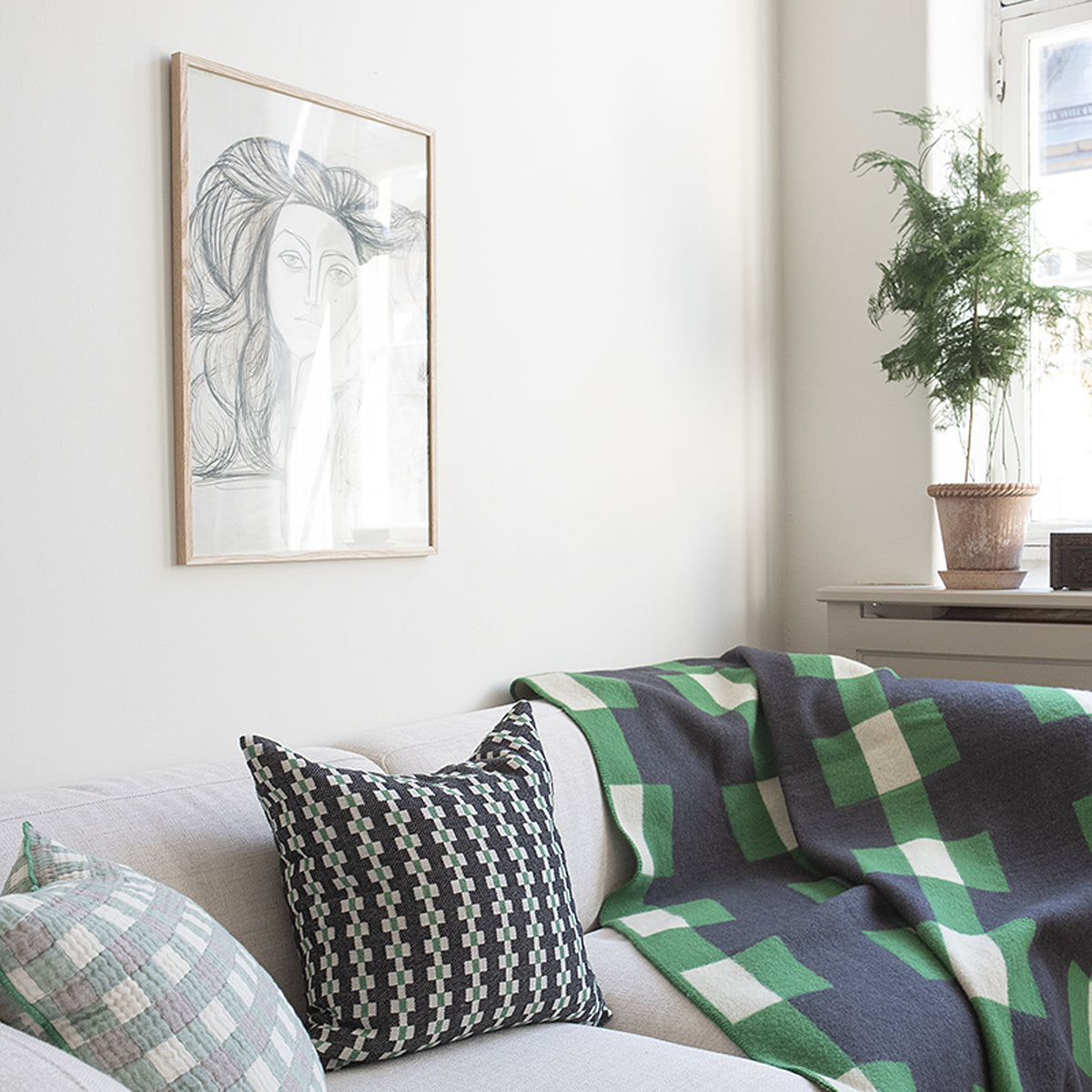 Marta Wool Blanket by Brita, showing marta wool blanket in live shot.
